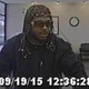Surveillance footage from the Indiana Members Credit Union shows one of the suspects who reportedly robbed the bank wearing full Rick James braids.
ABC 6 screenshot